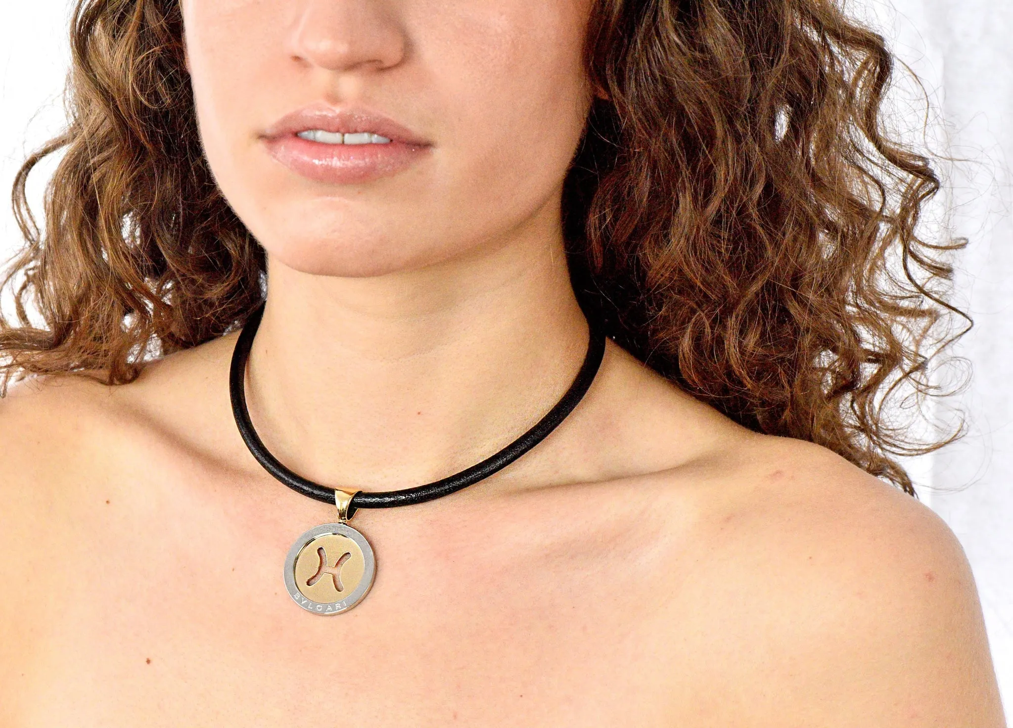 Bulgari Modern 18 Karat Gold Steel Gemini Zodiac Tondo Pendant Necklace