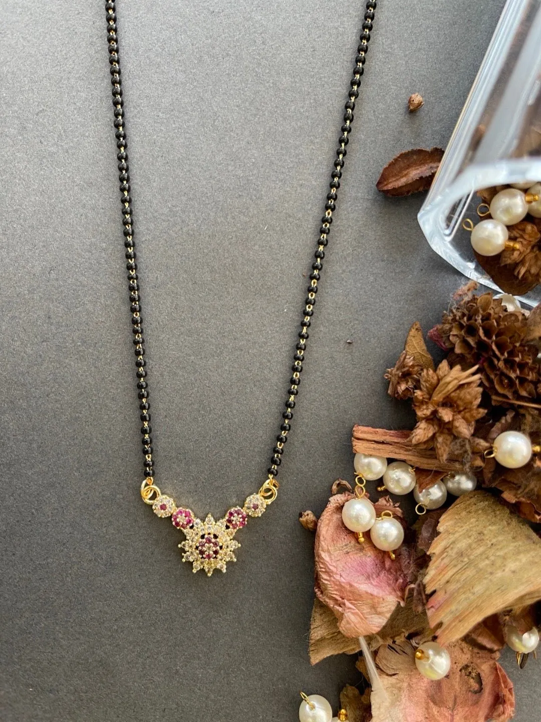 Short Mangalsutra Designs Fancy American Diamond Flower Pendant Black Beads Chain